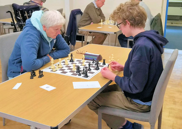 Two people playing chess